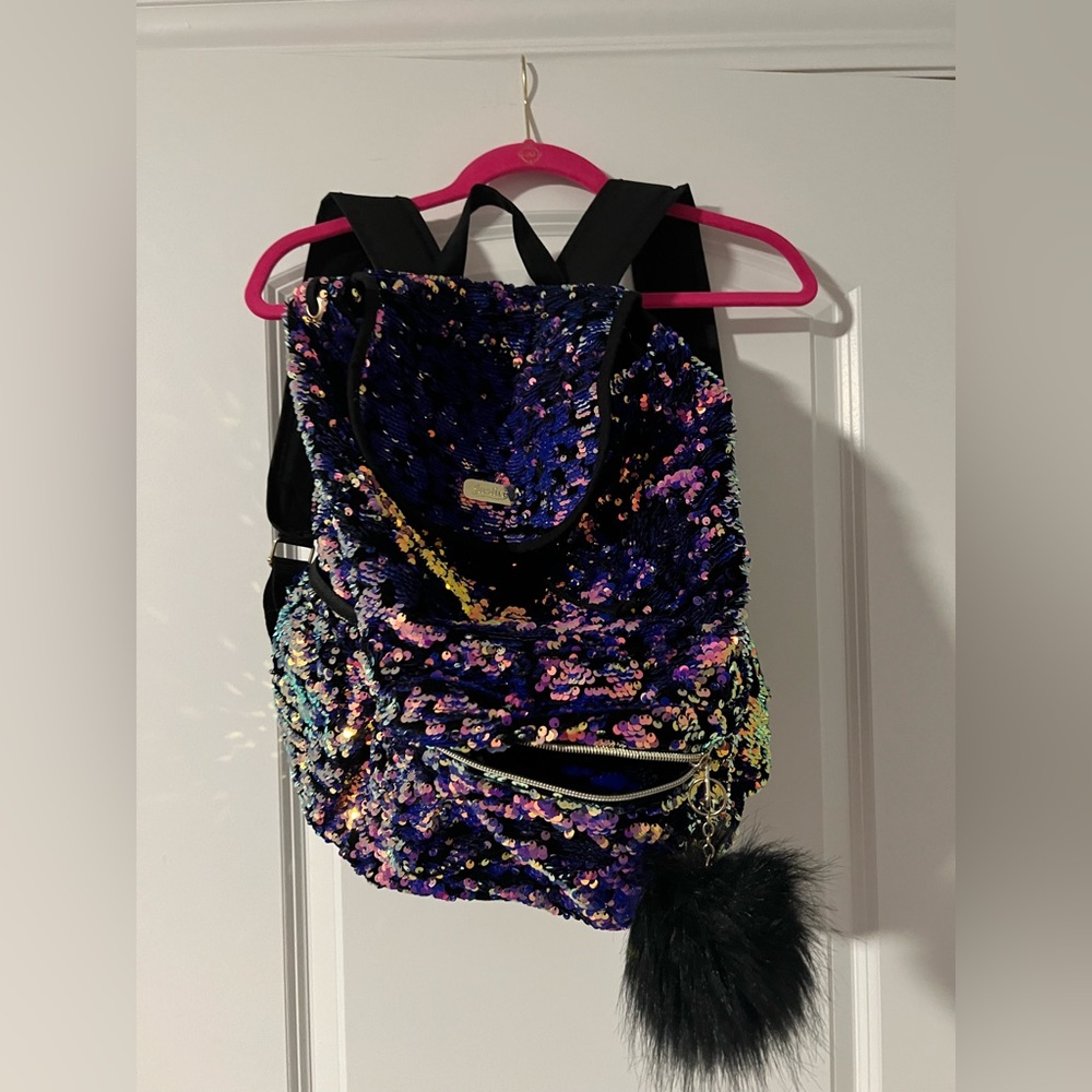 Used good condition- Justice Sparkle Backpack
